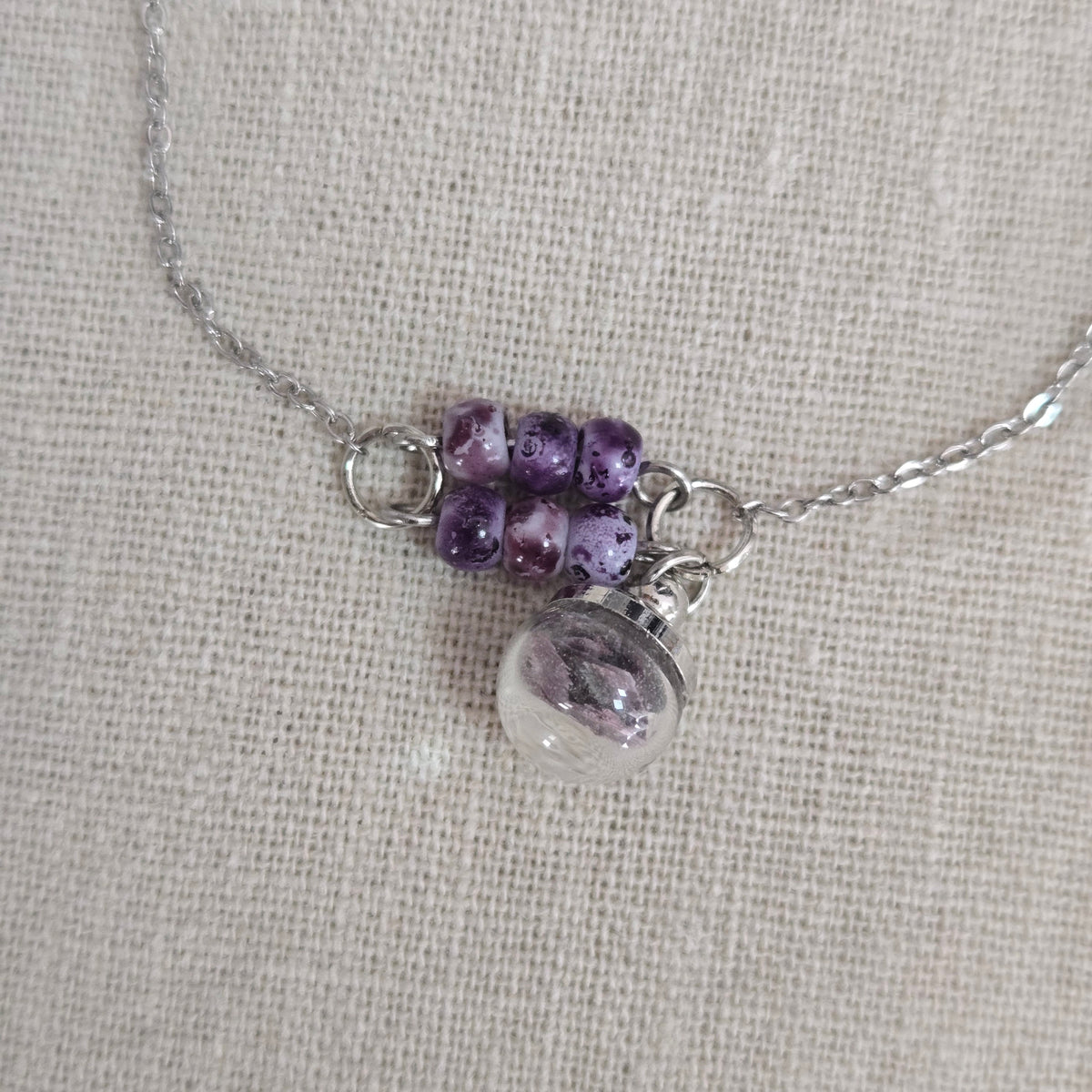 Bracelet violet perles éclats coquillage