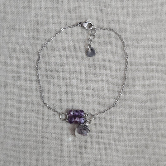 Bracelet violet perles éclats coquillage