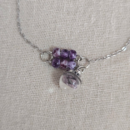 Bracelet violet perles éclats coquillage