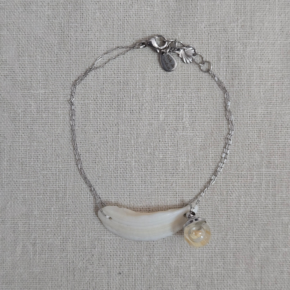 Bracelet coquillage et eau de mer