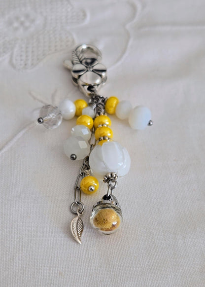 Porte-bonheur, bijou de sac jaune mimosa