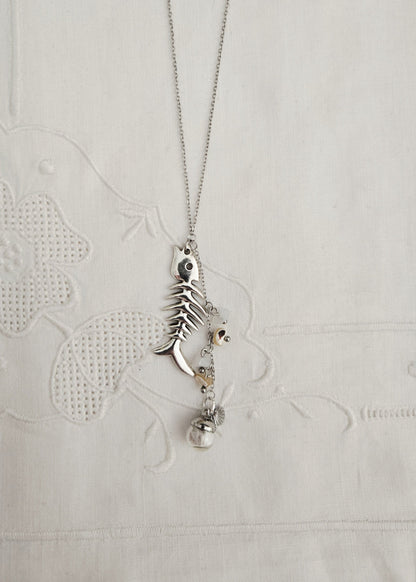 Collier nacre et charm poisson