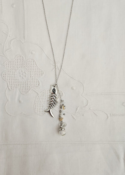 Collier nacre et charm poisson