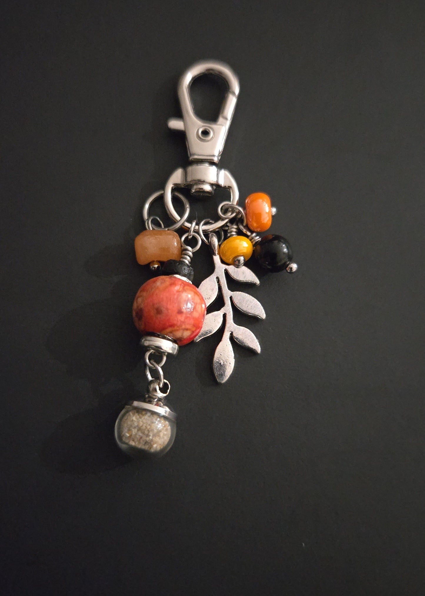 Porte-bonheur sable de plage et perles
