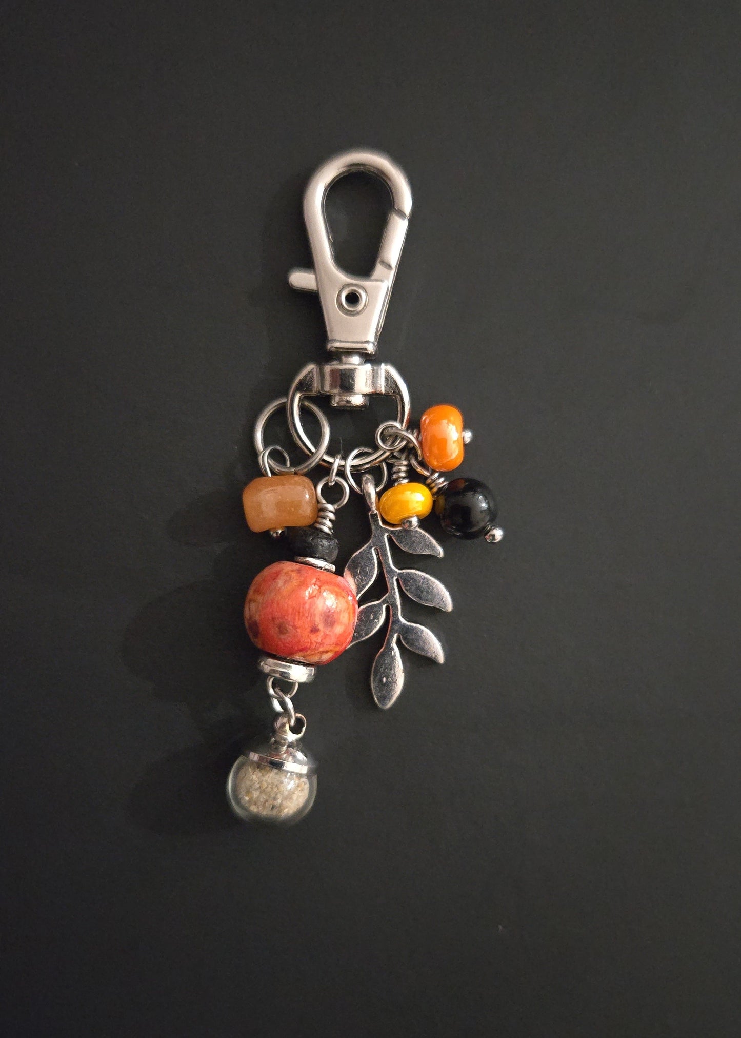 Porte-bonheur sable de plage et perles